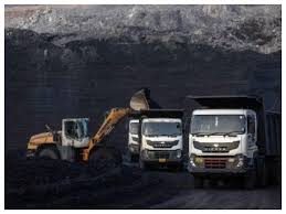 Loader and trucks